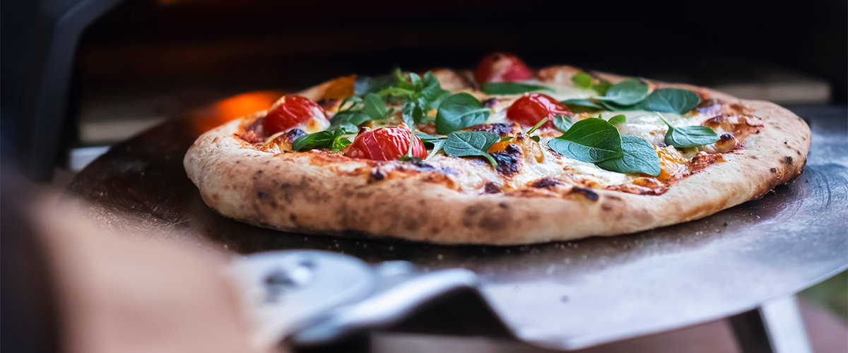 Pizza oven in outdoor kitchen